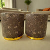 Stylish round ottomans pair