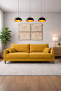 Yellow sofa in a modern living room with decor elements.