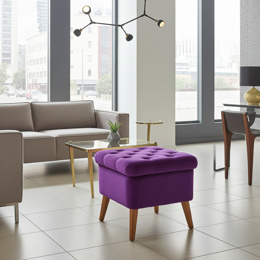 A purple tufted velvet ottoman with wooden legs in a modern living room setting.