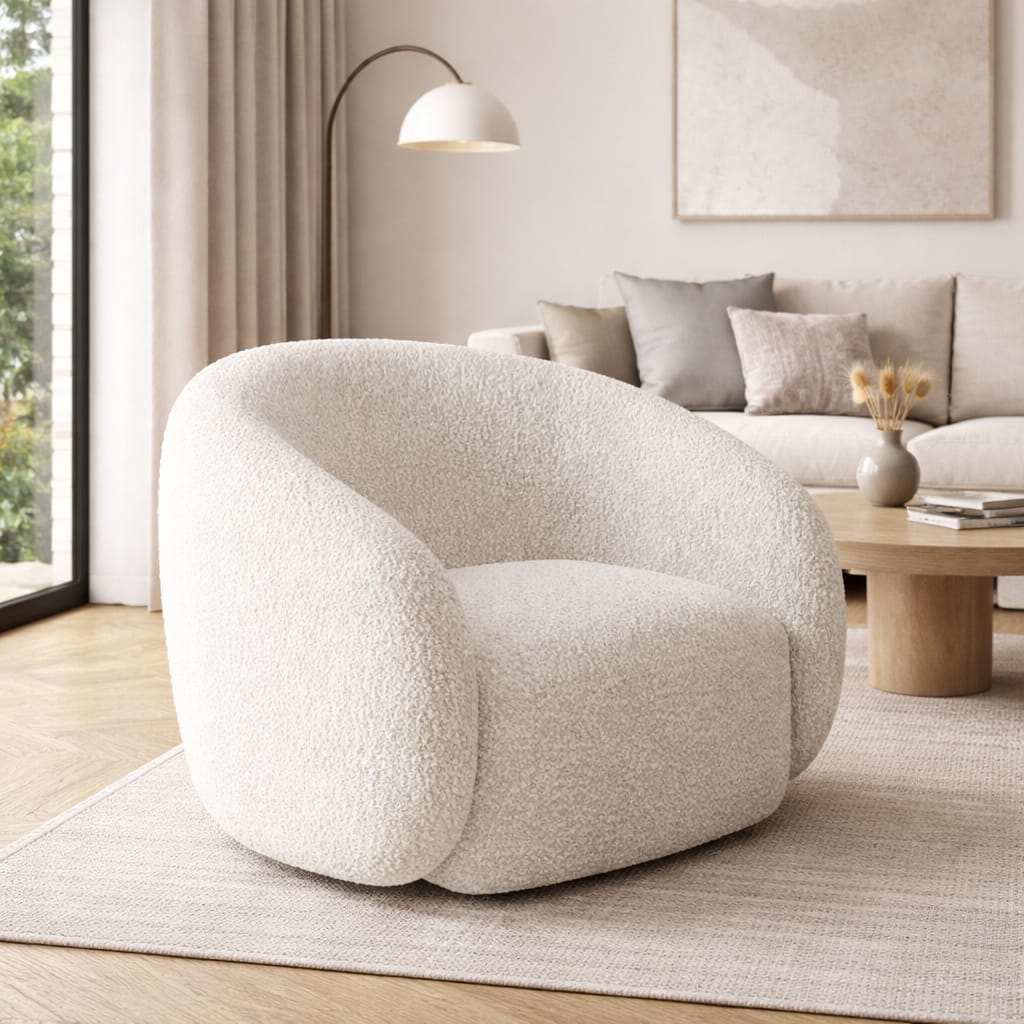 White textured armchair in a modern living room with a sofa and decor.